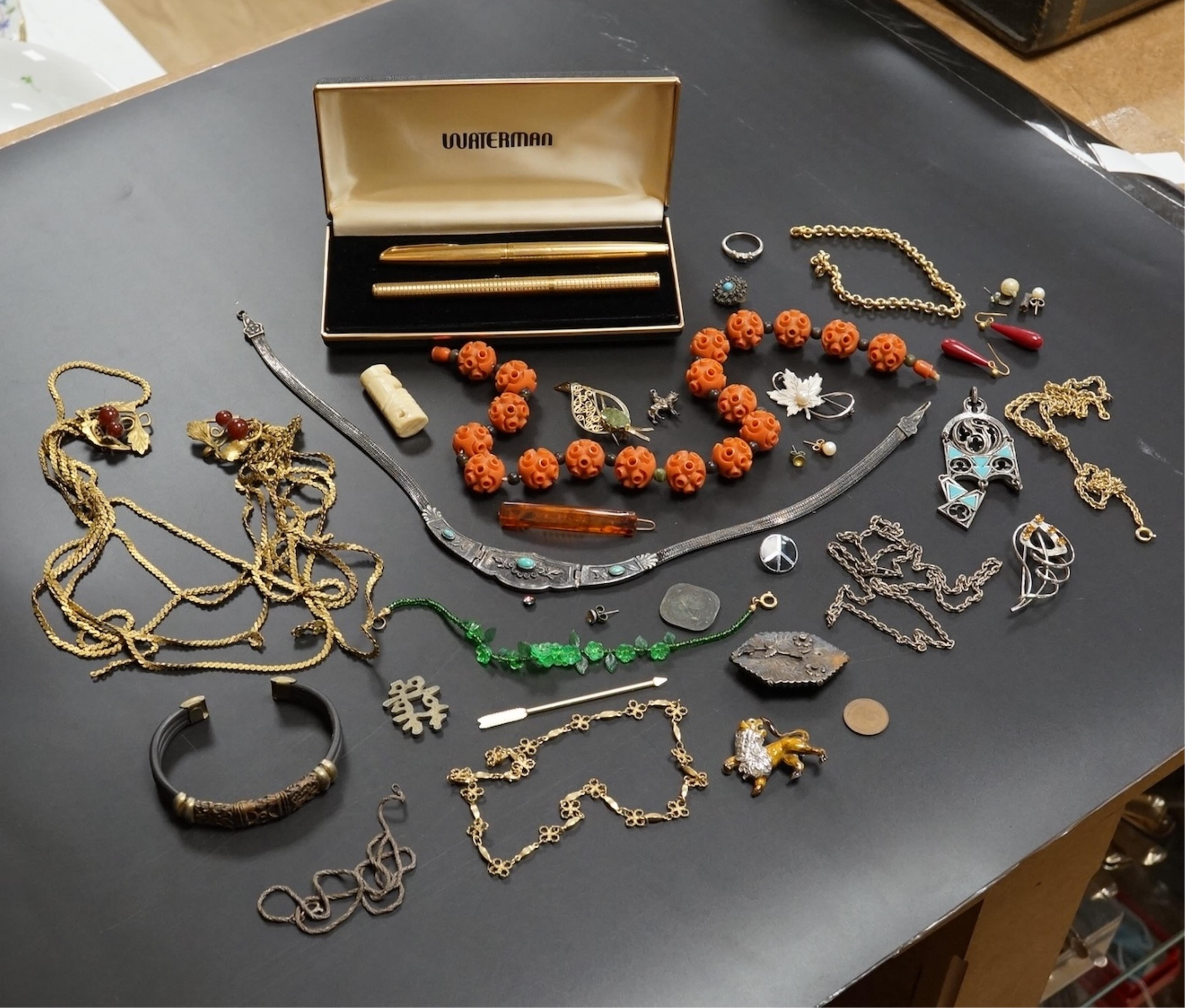 A small group of assorted costume and other jewellery, including a late Victorian silver hexagonal brooch(a.f.) a platinum and gem set ring and two pens Waterman and Elysee.